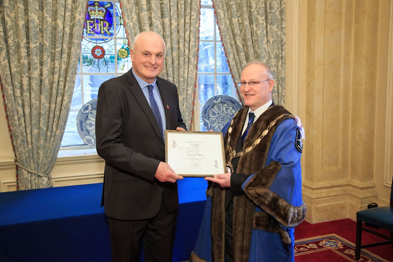 Philip Morrish, Master of the Worshipful Company of Environmental Cleaners preseting the Award
